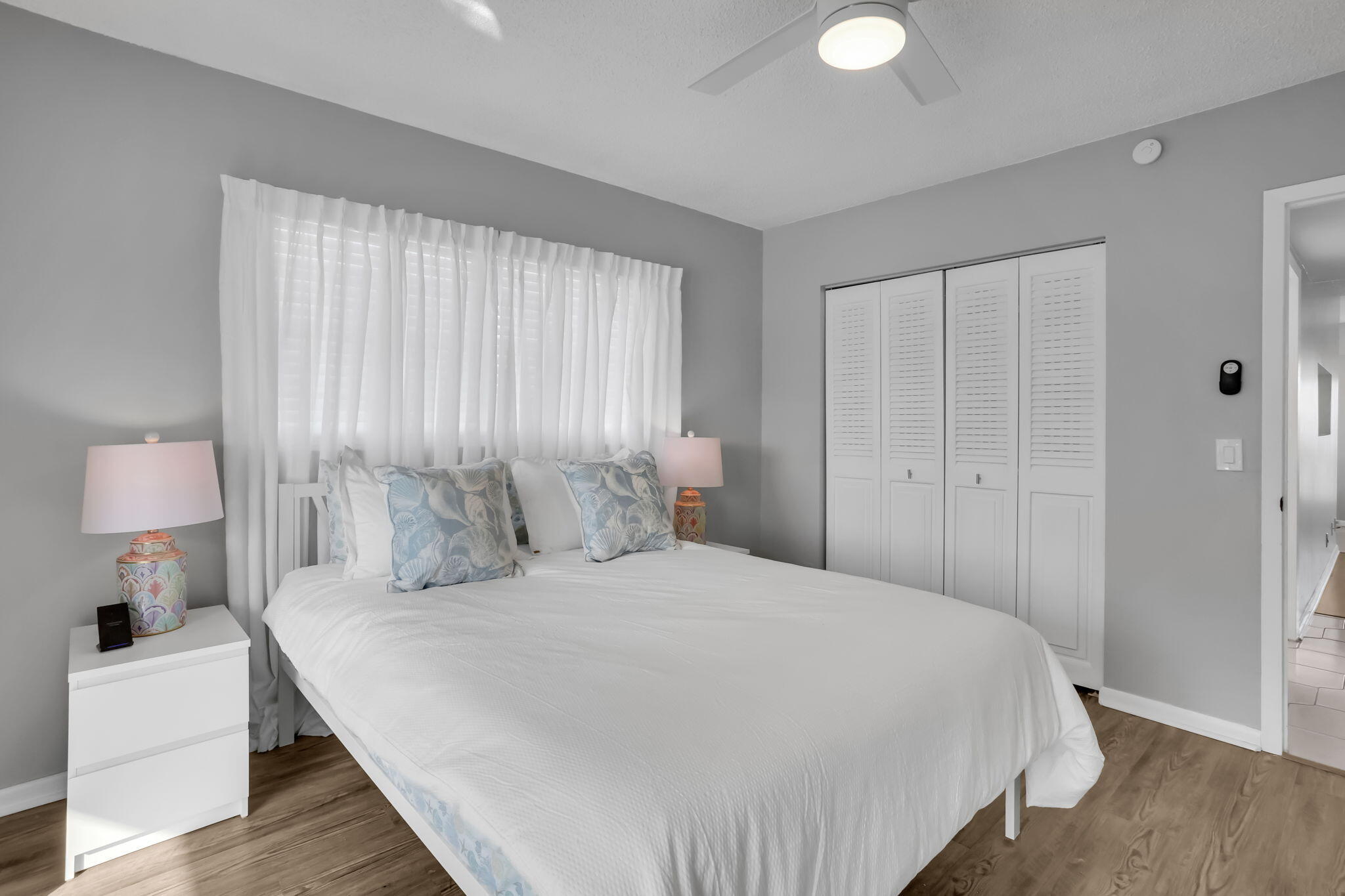 336 Dorset H Boca Raton, FL 33434 - Photo 13 of 31 a bedroom with a bed and a lamp