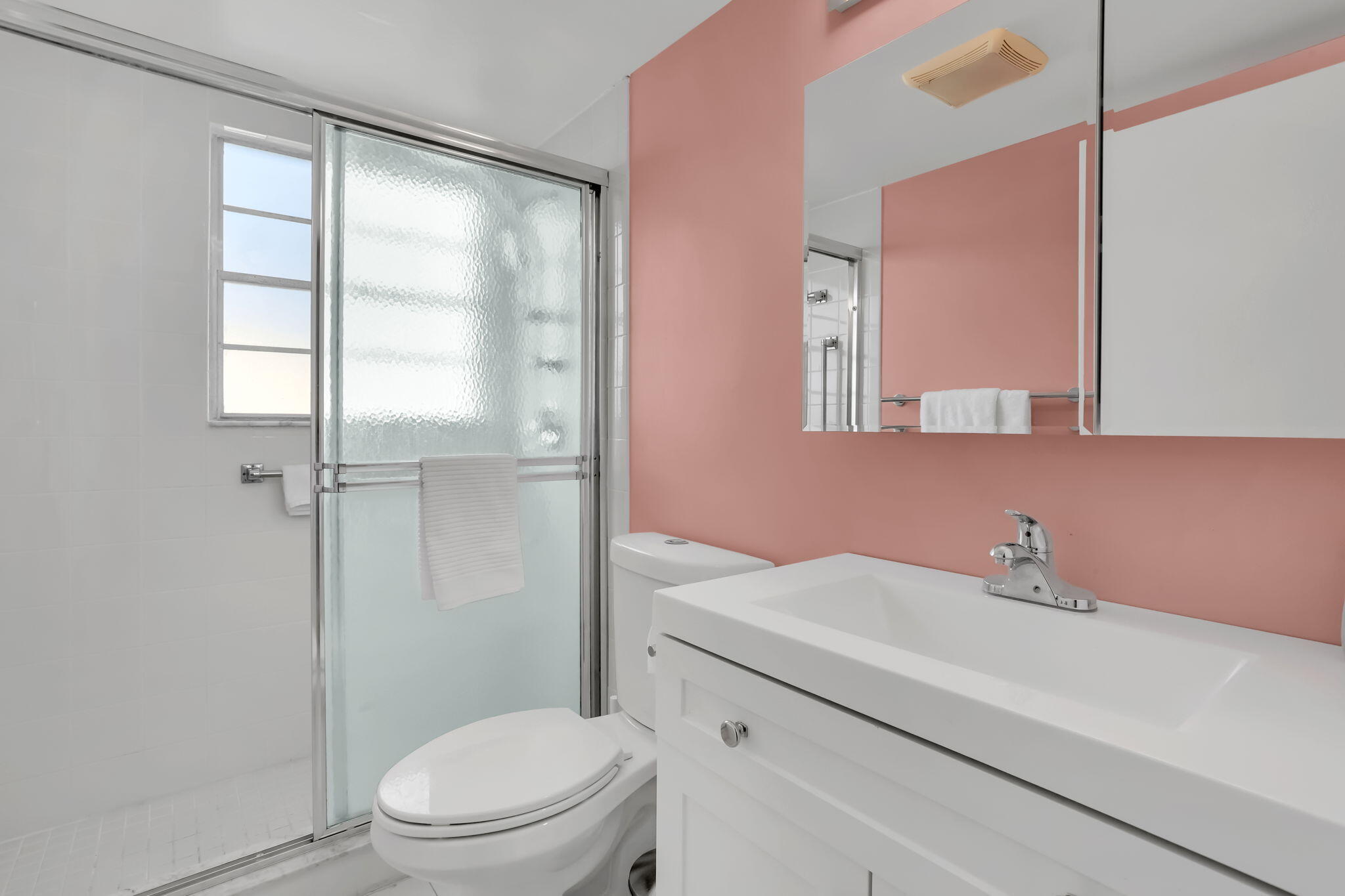 336 Dorset H Boca Raton, FL 33434 - Photo 14 of 31 a bathroom with a sink a toilet and shower