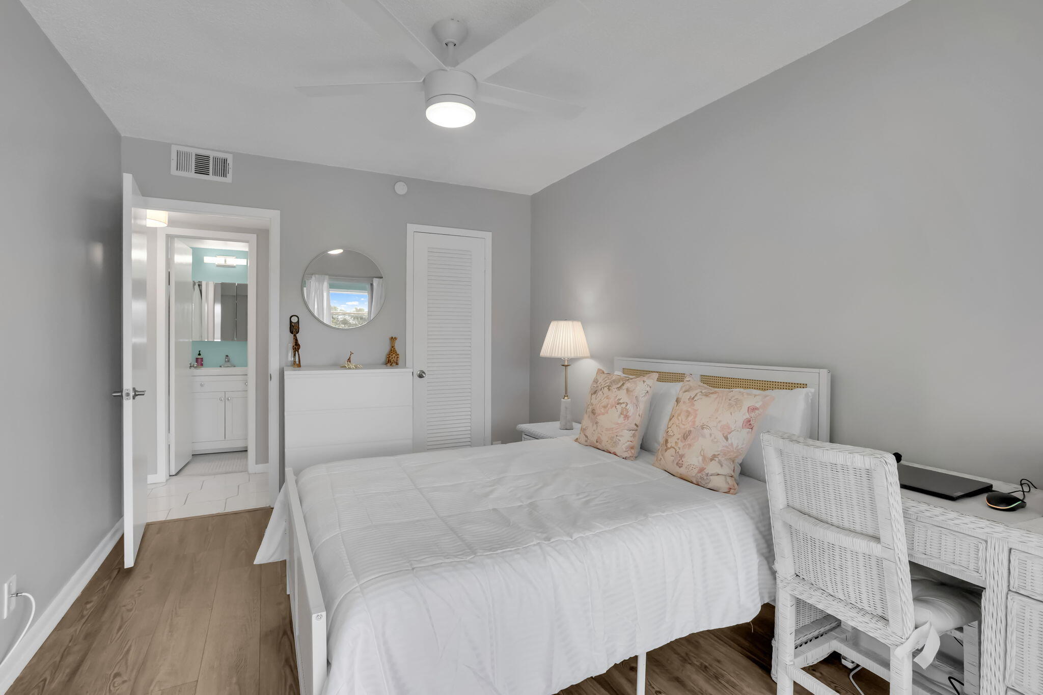 336 Dorset H Boca Raton, FL 33434 - Photo 16 of 31 a bedroom with a bed and a table