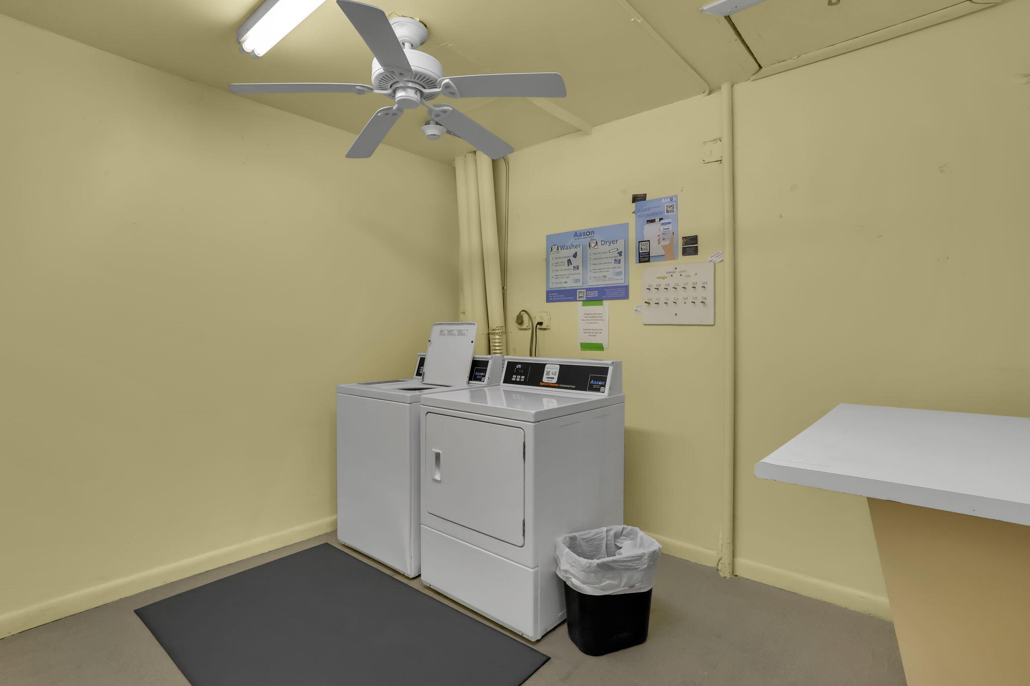 336 Dorset H Boca Raton, FL 33434 - Photo 24 of 31 a bathroom with a sink a toilet and vanity