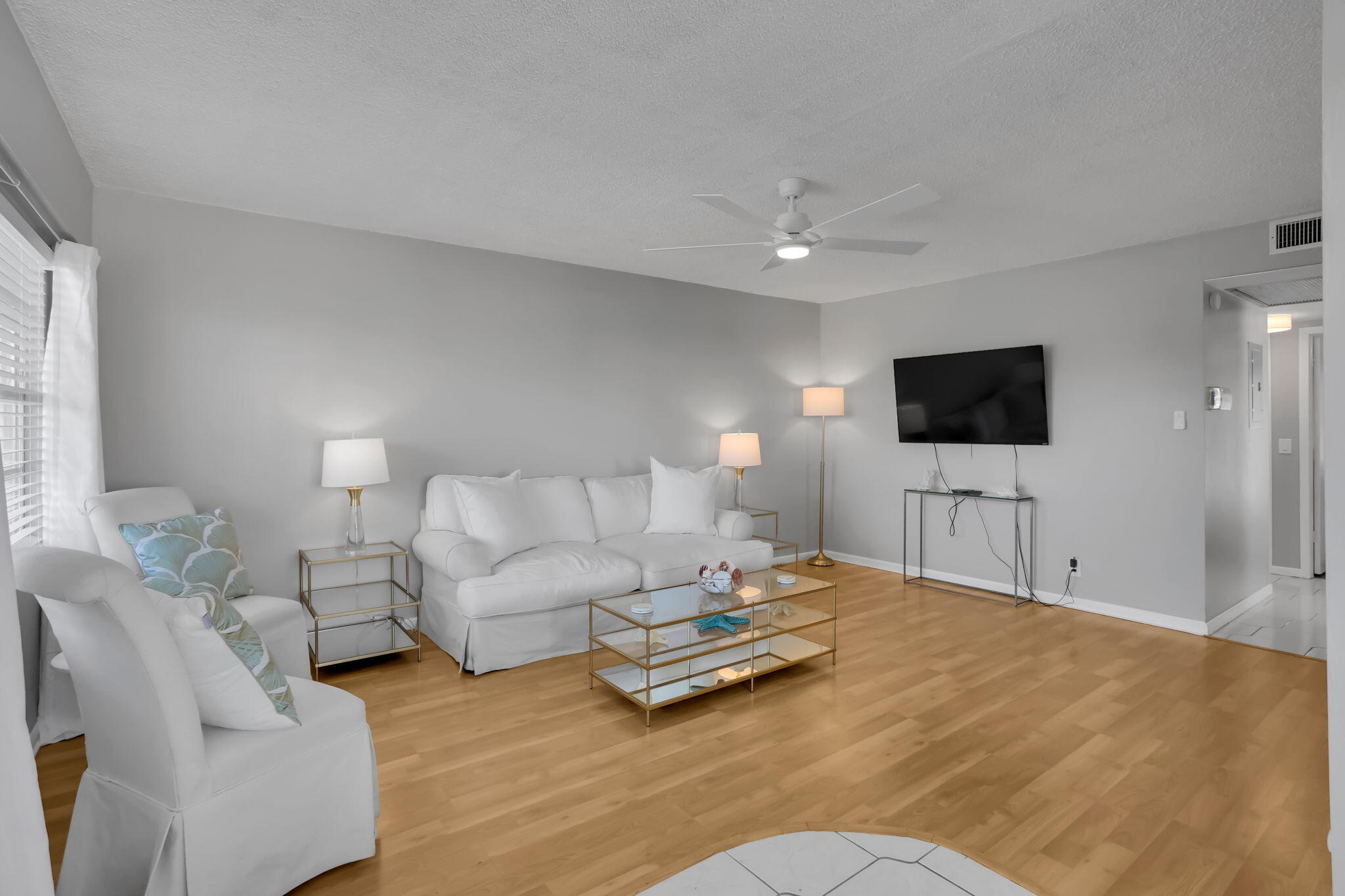 336 Dorset H Boca Raton, FL 33434 - Photo 4 of 31 a living room with furniture and a flat screen tv