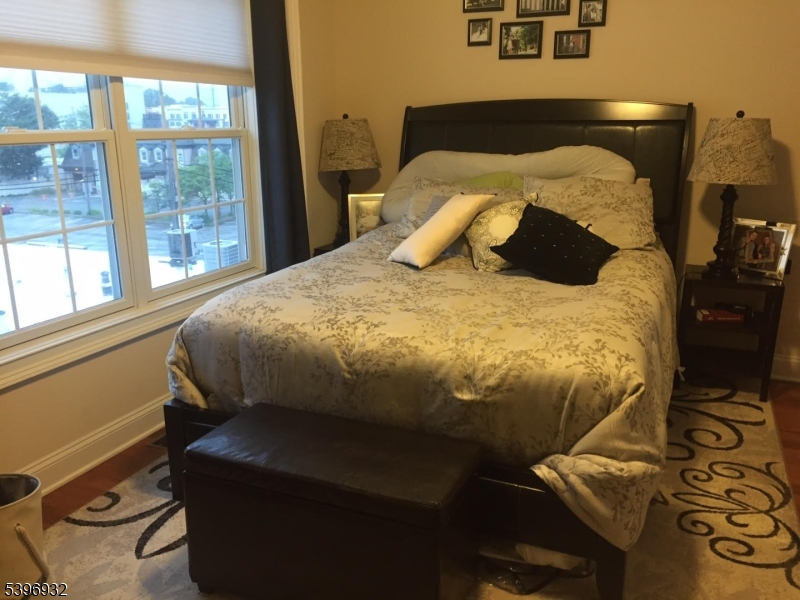 459 Main Street Metuchen, NJ 08840 - Photo 13 of 15 a bedroom with a bed and a window