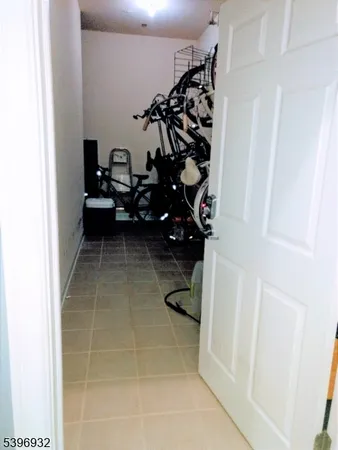 a view of a entryway door of the room