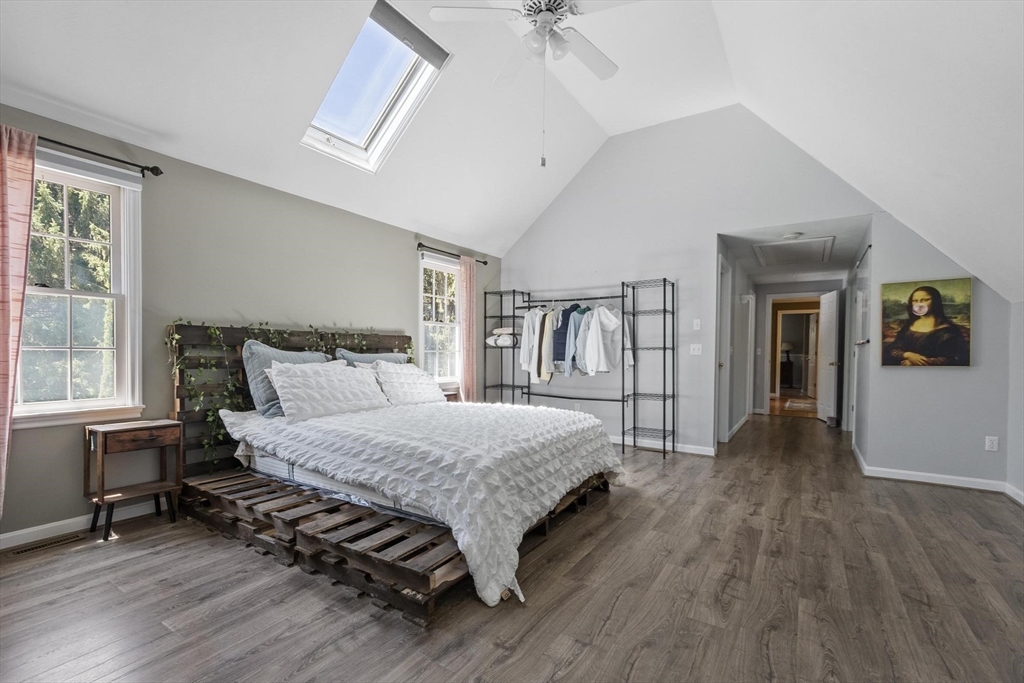 4 Ridge Road Pepperell, MA 01463 - Photo 21 of 42 a bedroom with a large bed and a window