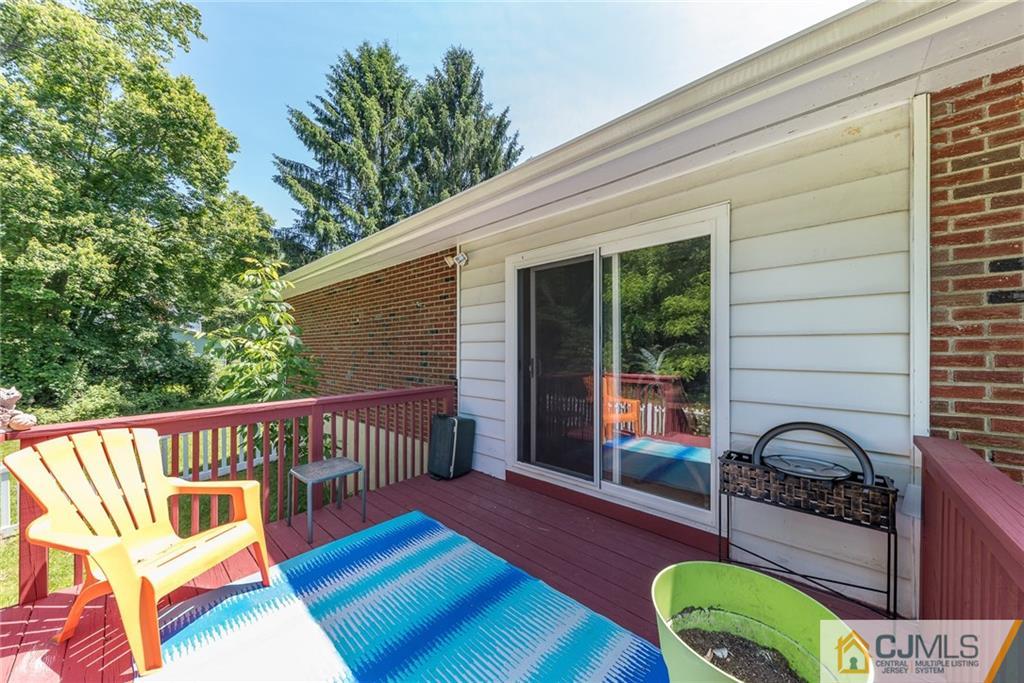 262 Bartley Road Chester, NJ 07930 - Photo 14 of 25 front view of a house with a chairs