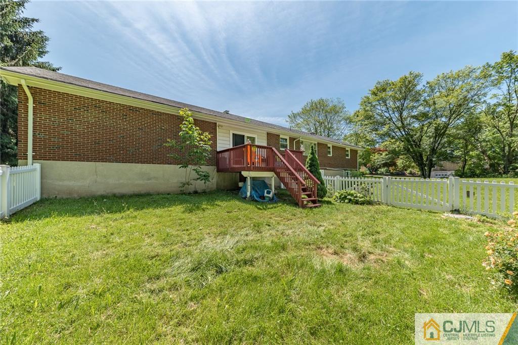 262 Bartley Road Chester, NJ 07930 - Photo 22 of 25 a view of a garden with a slide