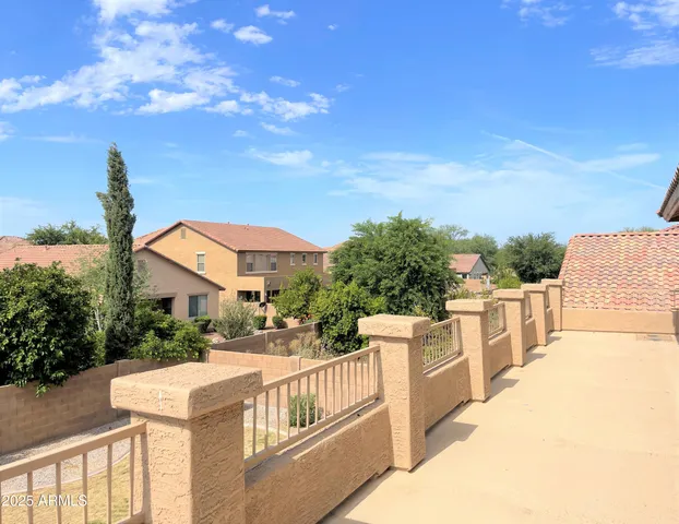 a balcony with a city view
