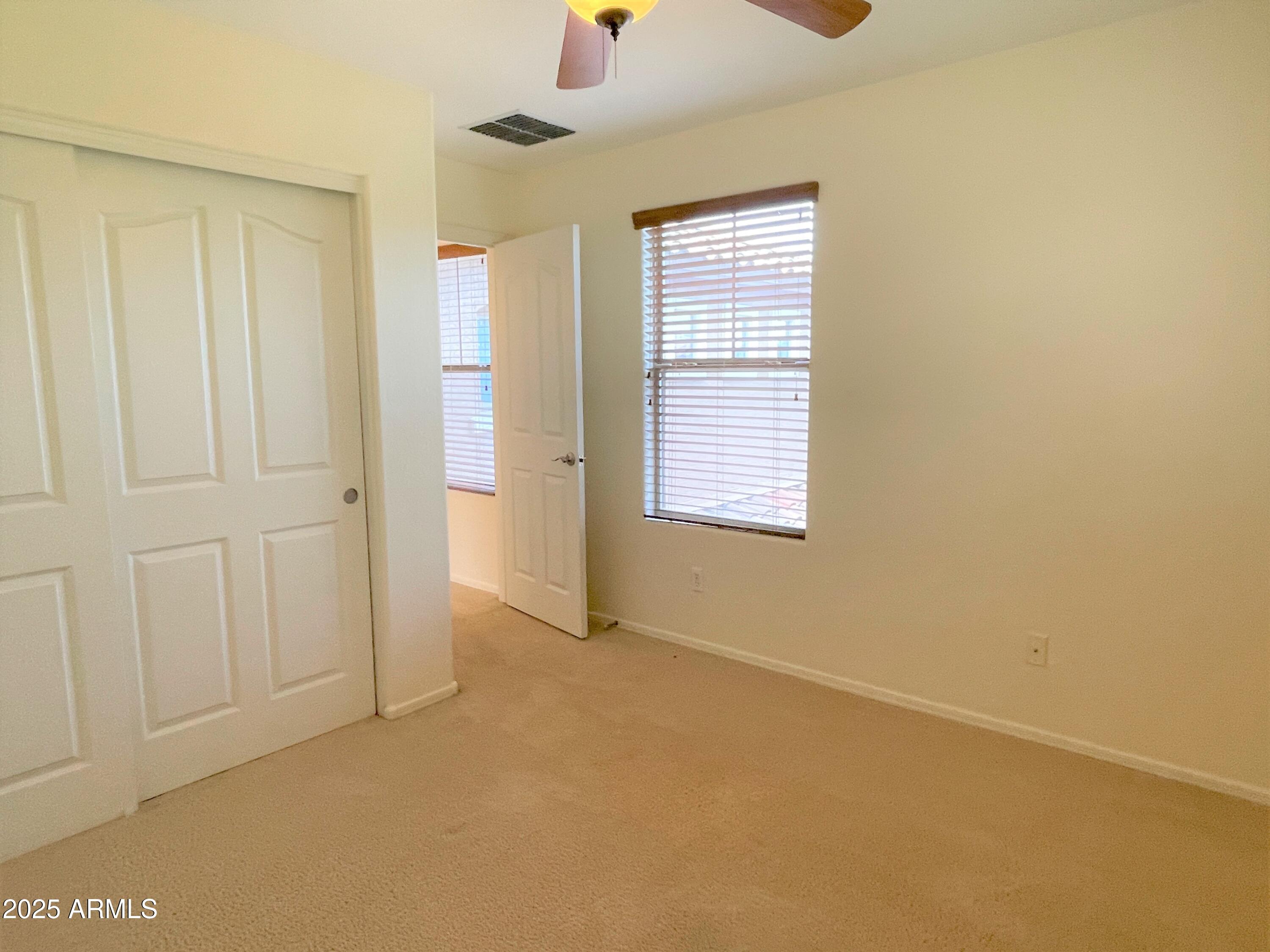 3663 East Sparrow Place Chandler, AZ 85286 - Photo 24 of 32 an empty room with windows