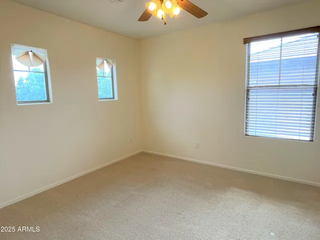 an empty room with a bathroom