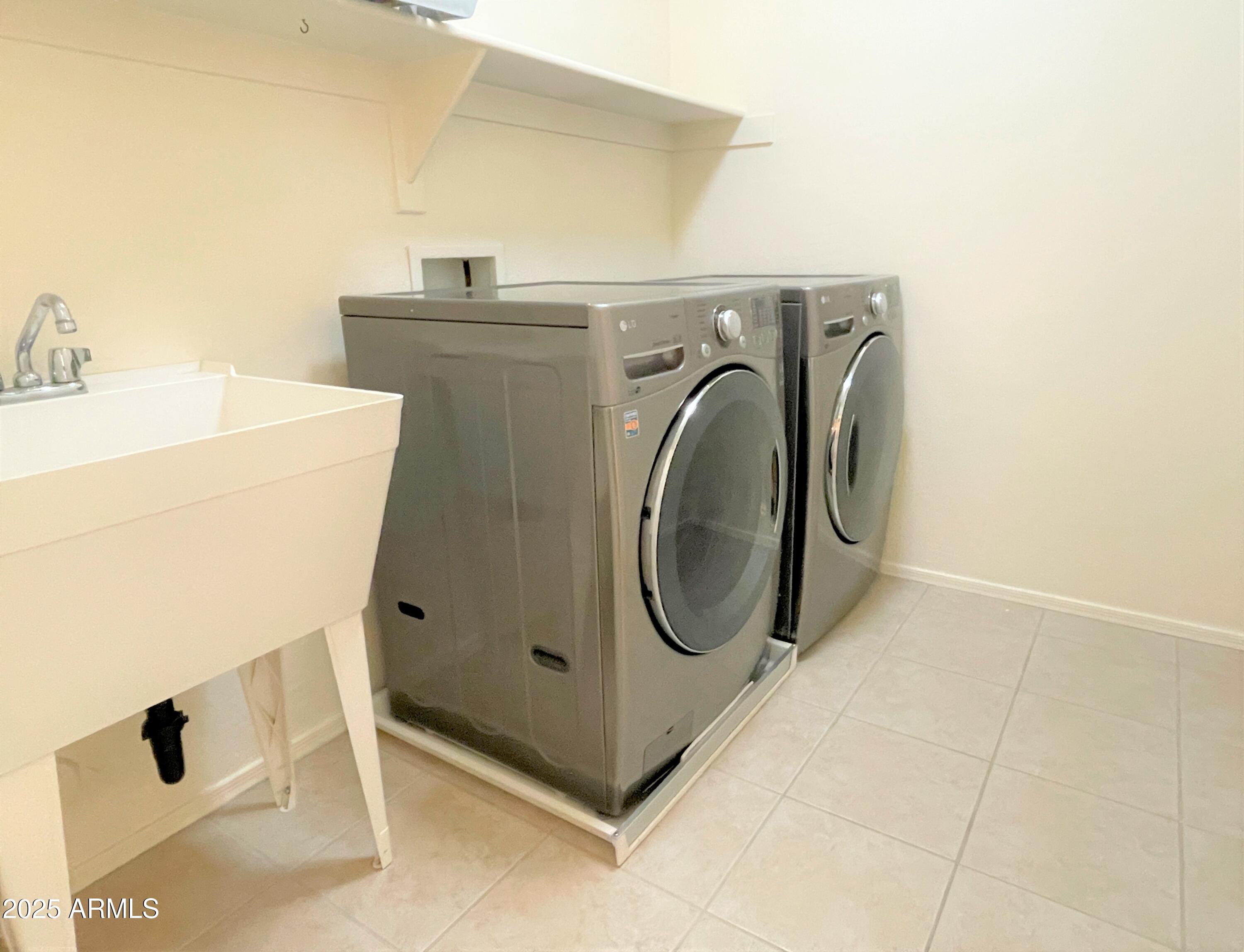 3663 East Sparrow Place Chandler, AZ 85286 - Photo 28 of 32 a utility room with dryer and washer