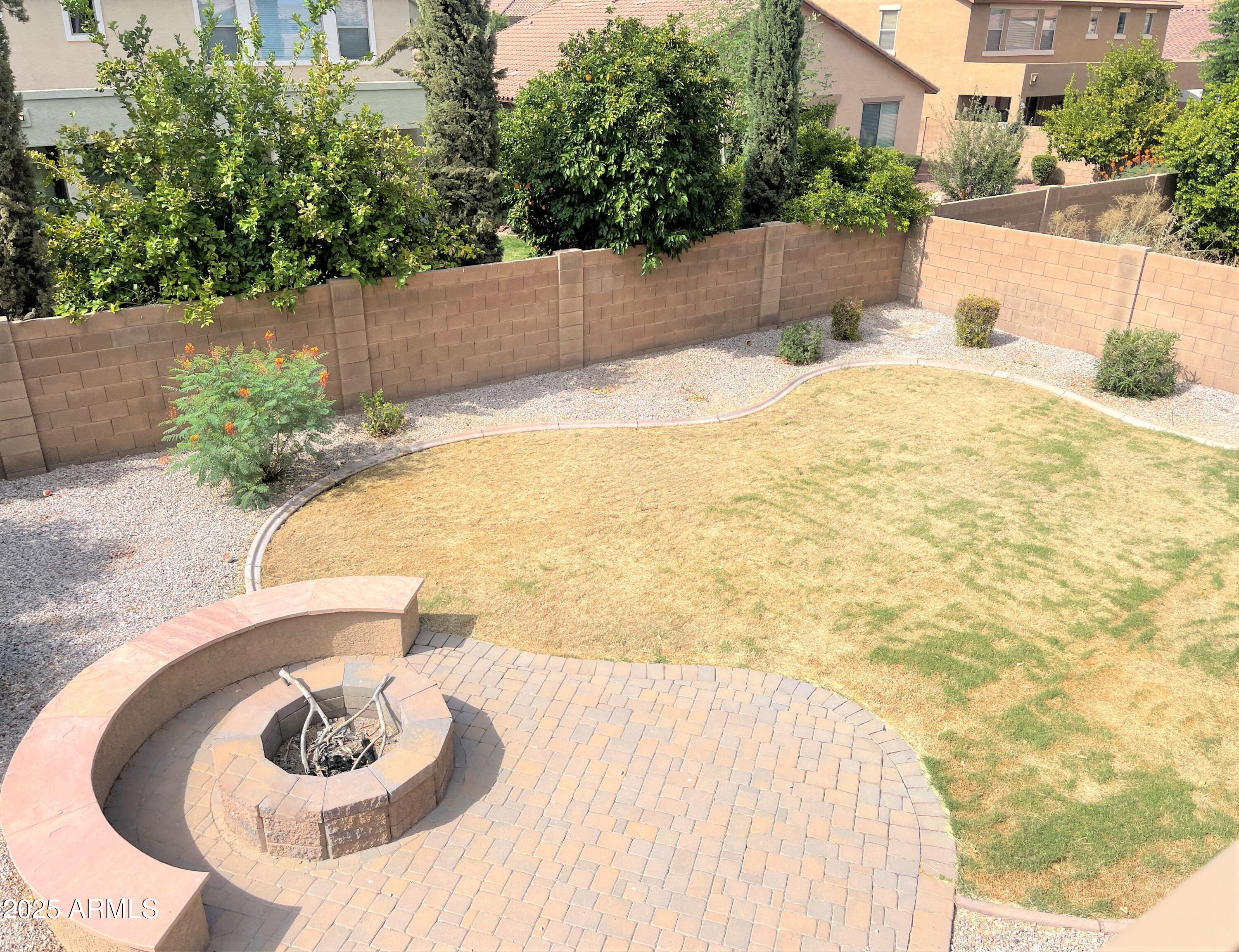 3663 East Sparrow Place Chandler, AZ 85286 - Photo 29 of 32 a view of a swimming pool with a patio
