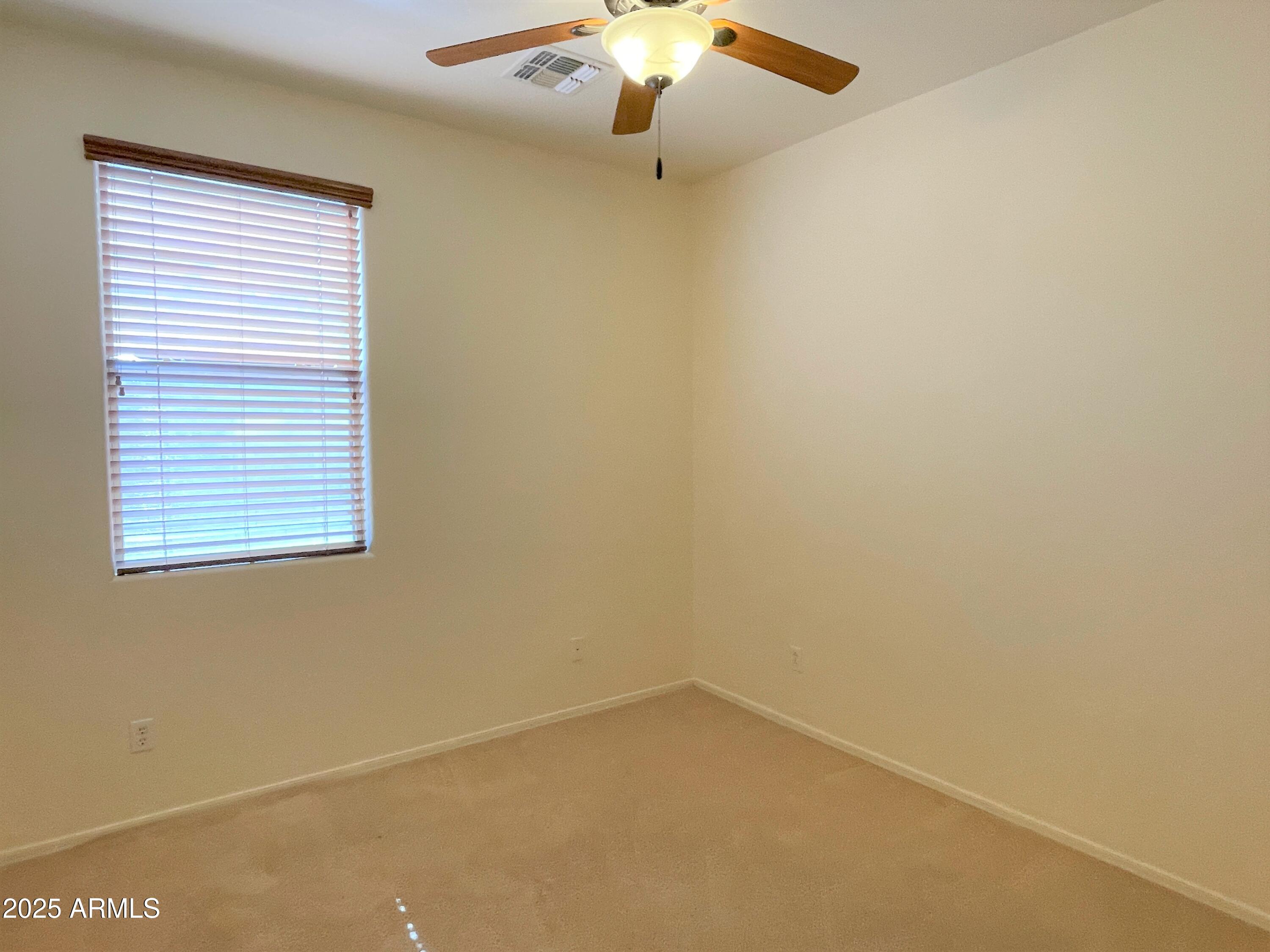 3663 East Sparrow Place Chandler, AZ 85286 - Photo 10 of 32 an empty room with a window
