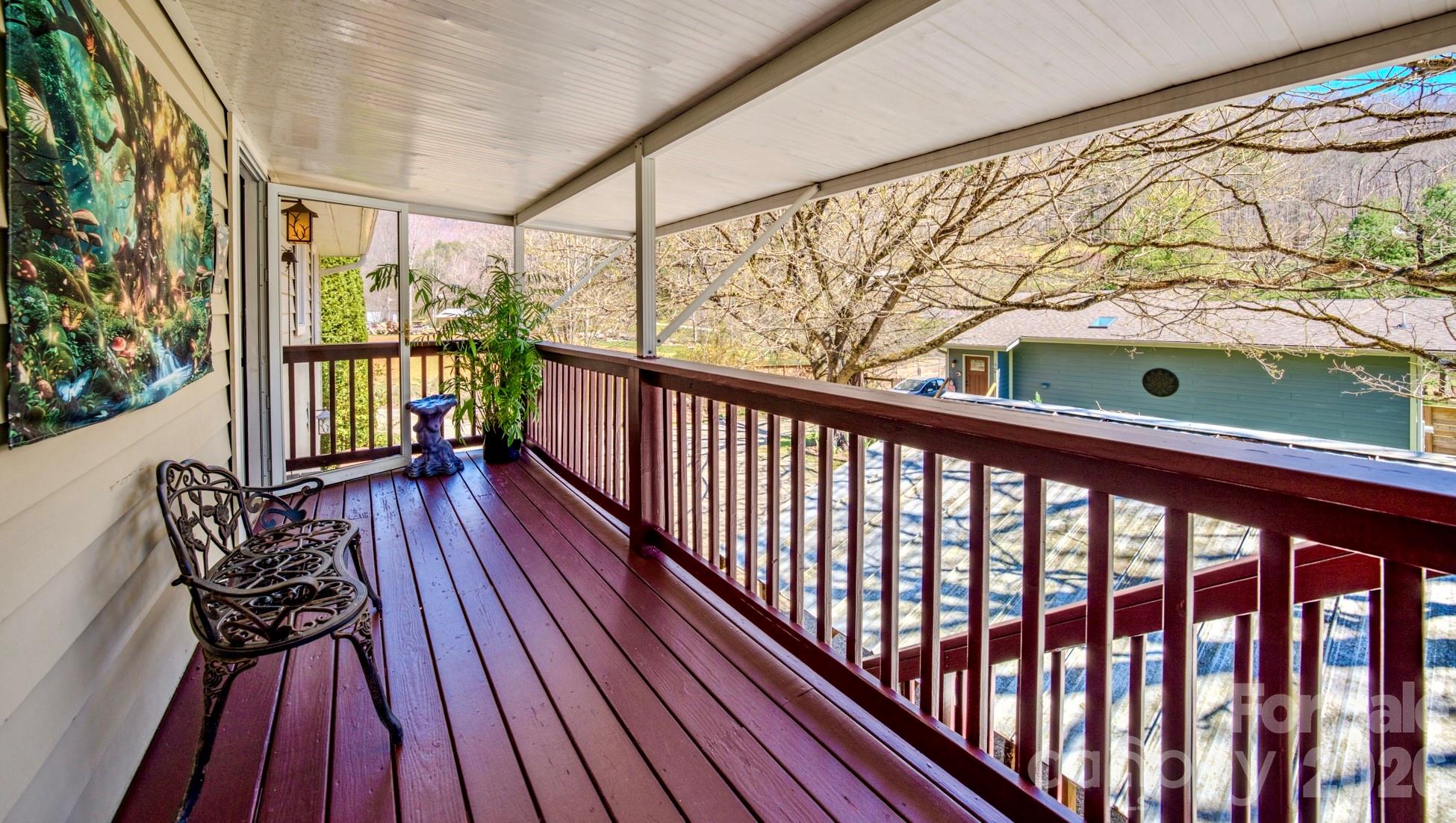 3 Taproot Trail Barnardsville, NC 28709 - Photo 12 of 48 a view of balcony with wooden floor