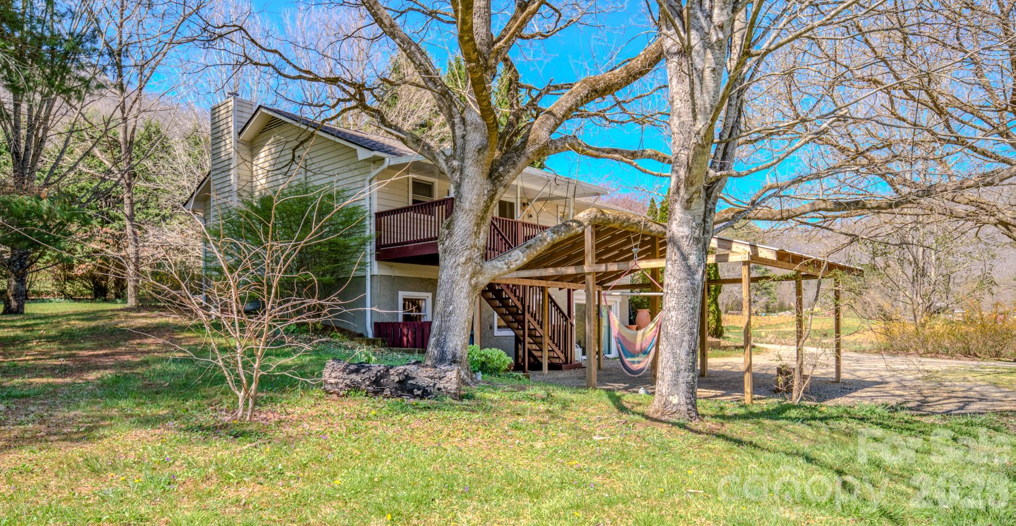 3 Taproot Trail Barnardsville, NC 28709 - Photo 2 of 48 a view of a house with a yard