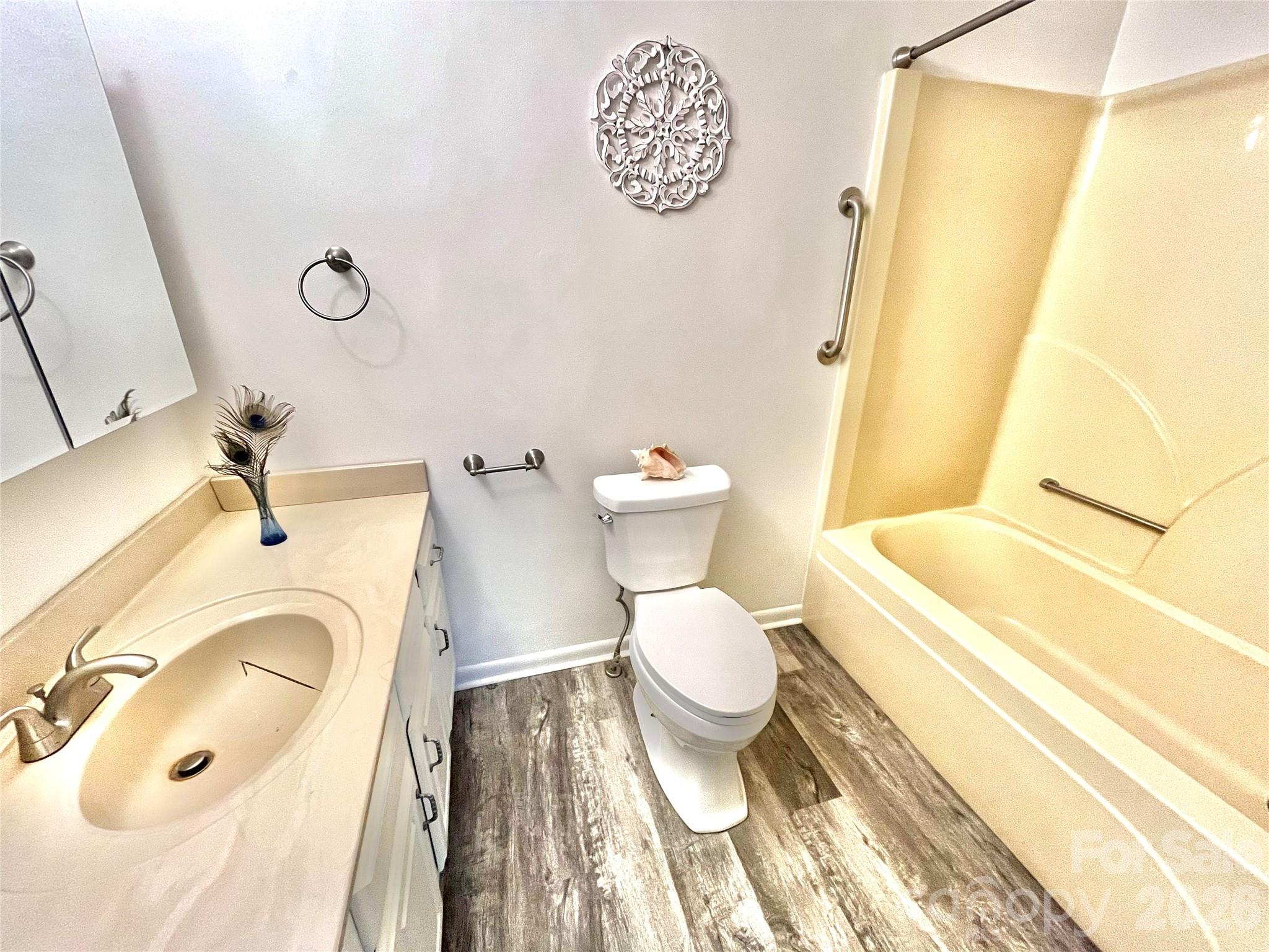 3 Taproot Trail Barnardsville, NC 28709 - Photo 22 of 48 a bathroom with a sink and a mirror