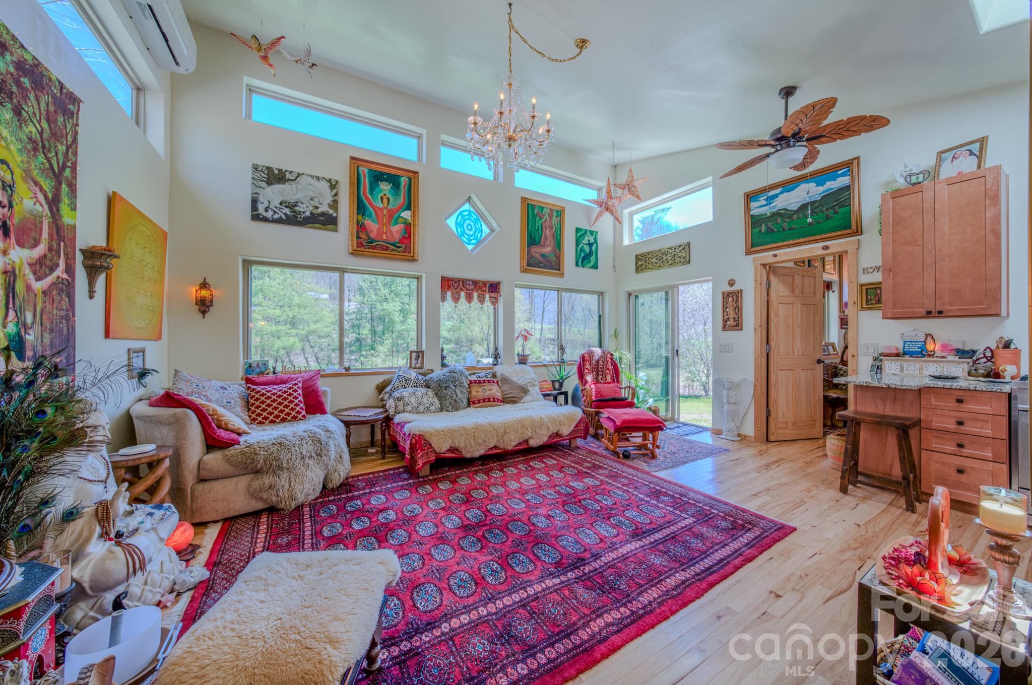 3 Taproot Trail Barnardsville, NC 28709 - Photo 31 of 48 a living room with patio area rug and wooden floor