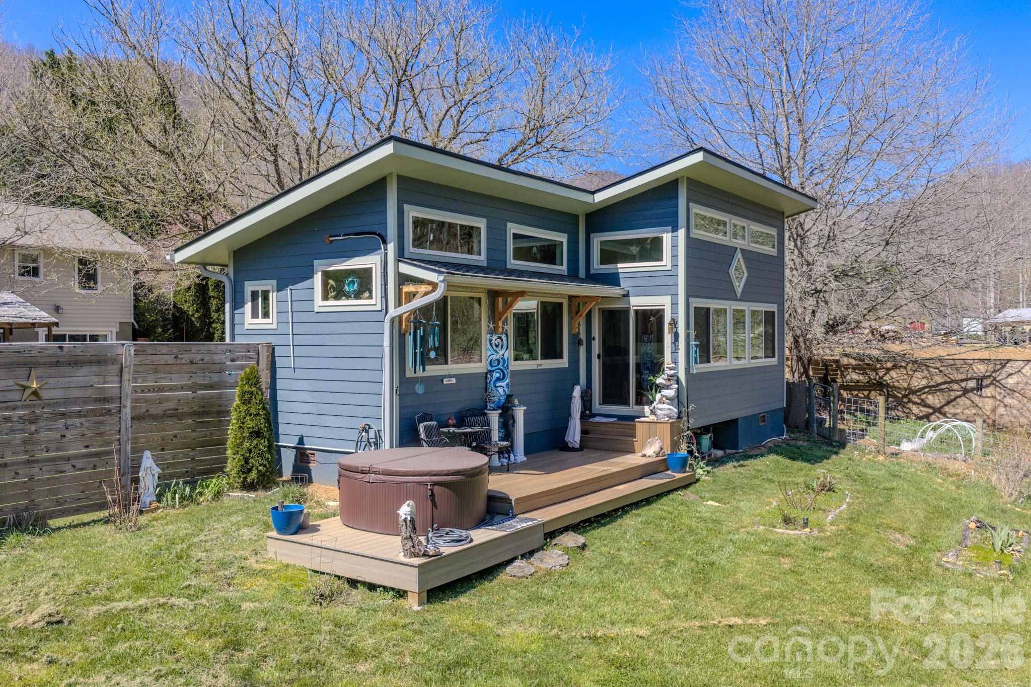 3 Taproot Trail Barnardsville, NC 28709 - Photo 5 of 48 a view of a house with a yard patio and fire pit