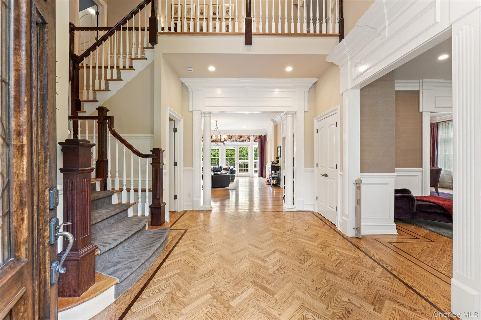 64 Stratton Road Scarsdale, NY 10583 - Photo 3 of 49 Double height entry foyer with beautiful herringbone floors