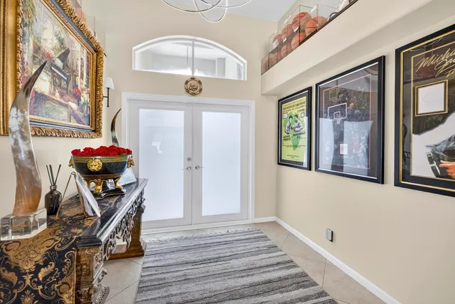 a view of a livingroom with furniture window and wooden floor