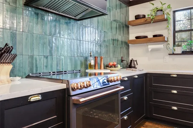 a view of a dining room with furniture large windows and wooden floor