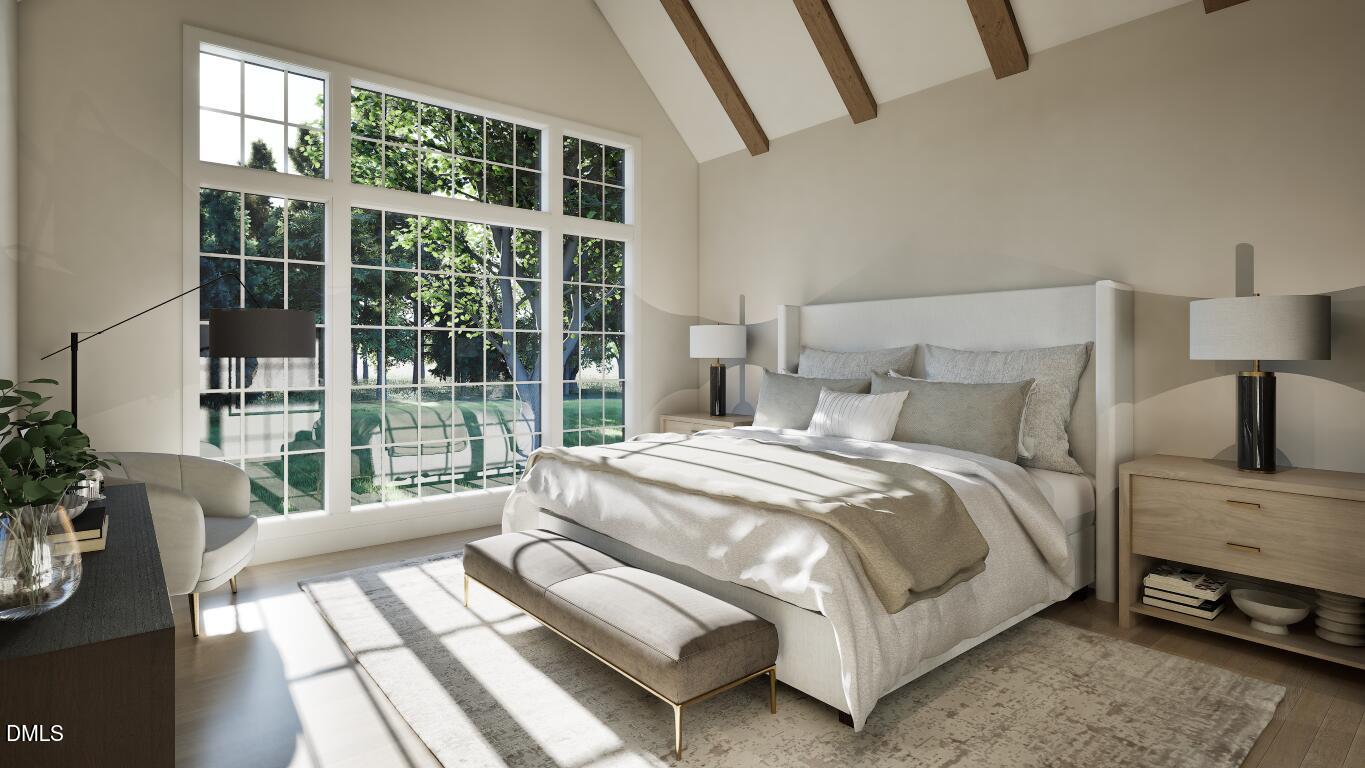 3032 Lewis Farm Road Raleigh, NC 27607 - Photo 11 of 34 a bedroom with a bed and a large window