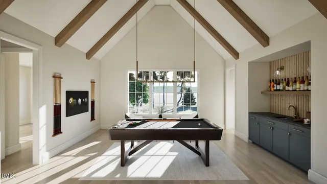 a kitchen with a table and chairs in it