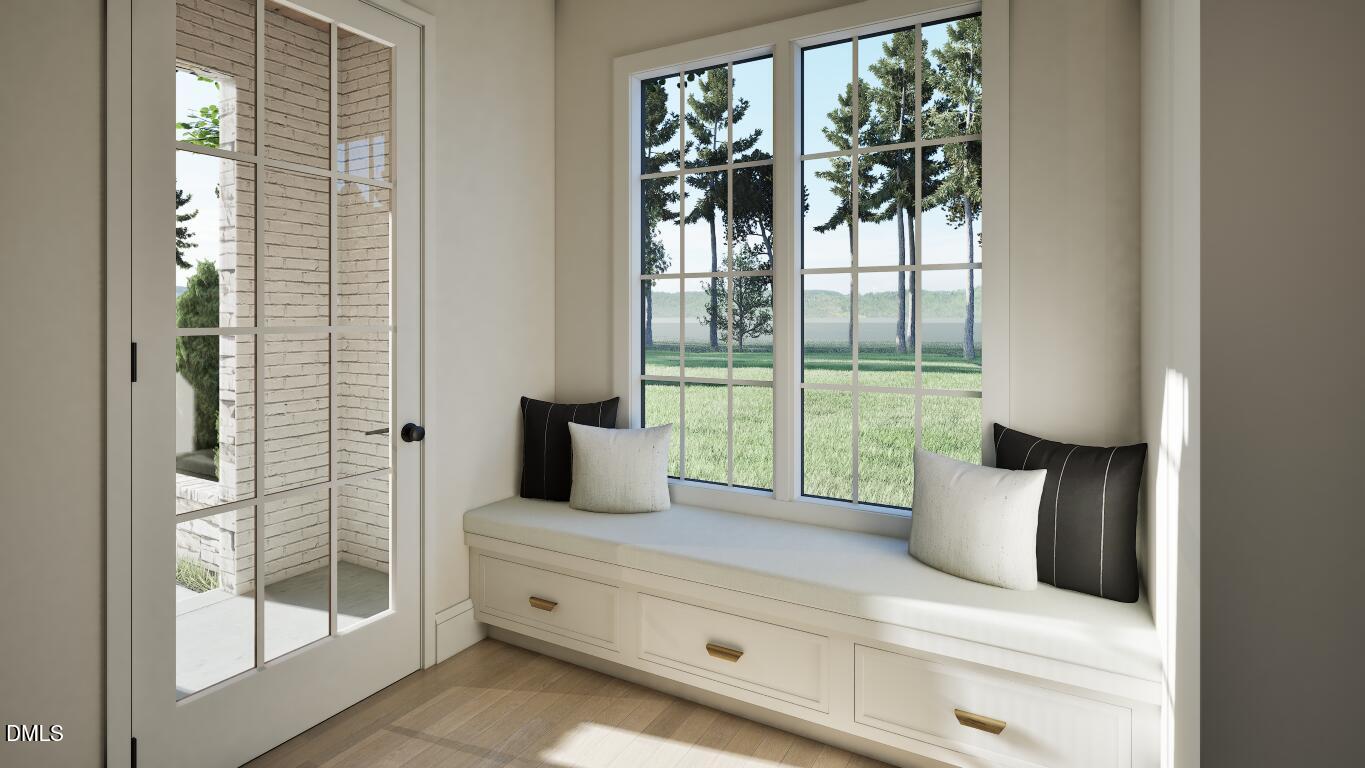 3032 Lewis Farm Road Raleigh, NC 27607 - Photo 26 of 34 a bedroom with a large bed and a large window