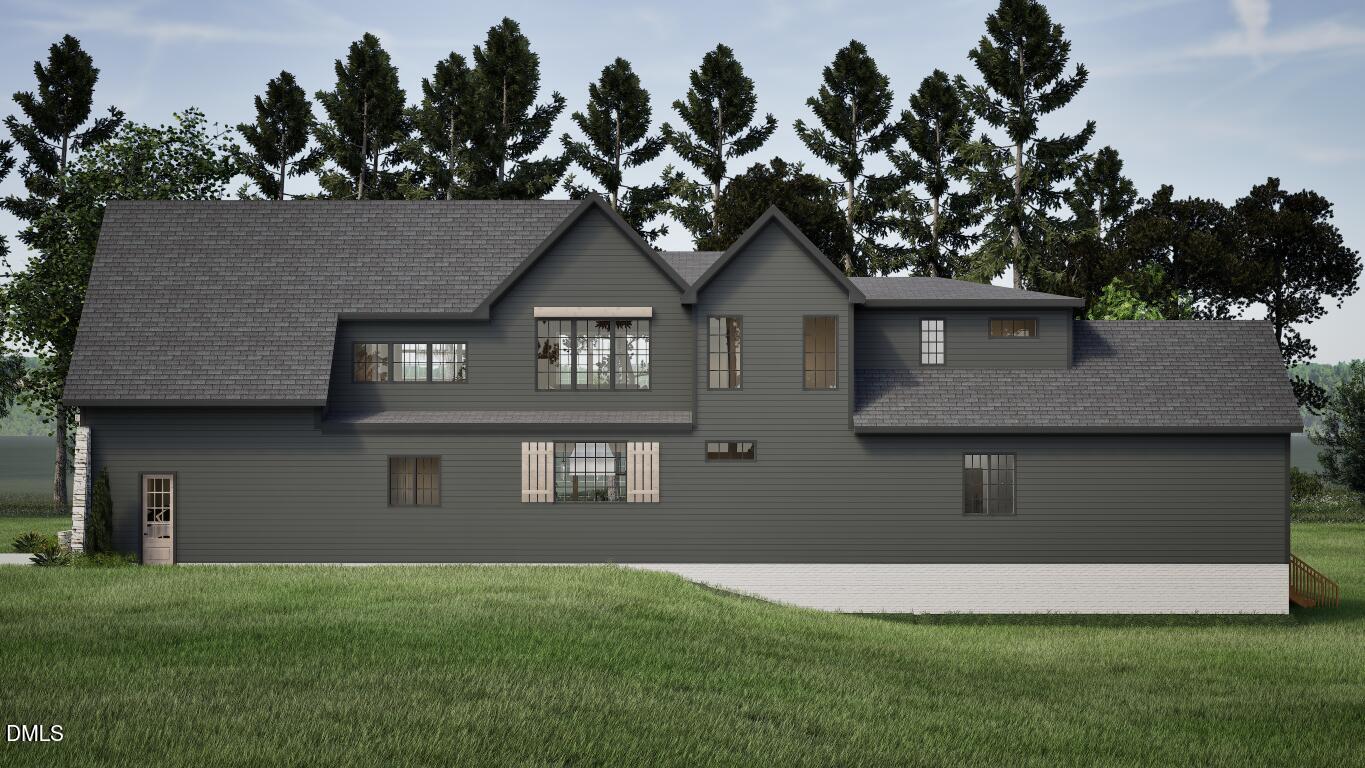 3032 Lewis Farm Road Raleigh, NC 27607 - Photo 33 of 34 a front view of a house with a garden