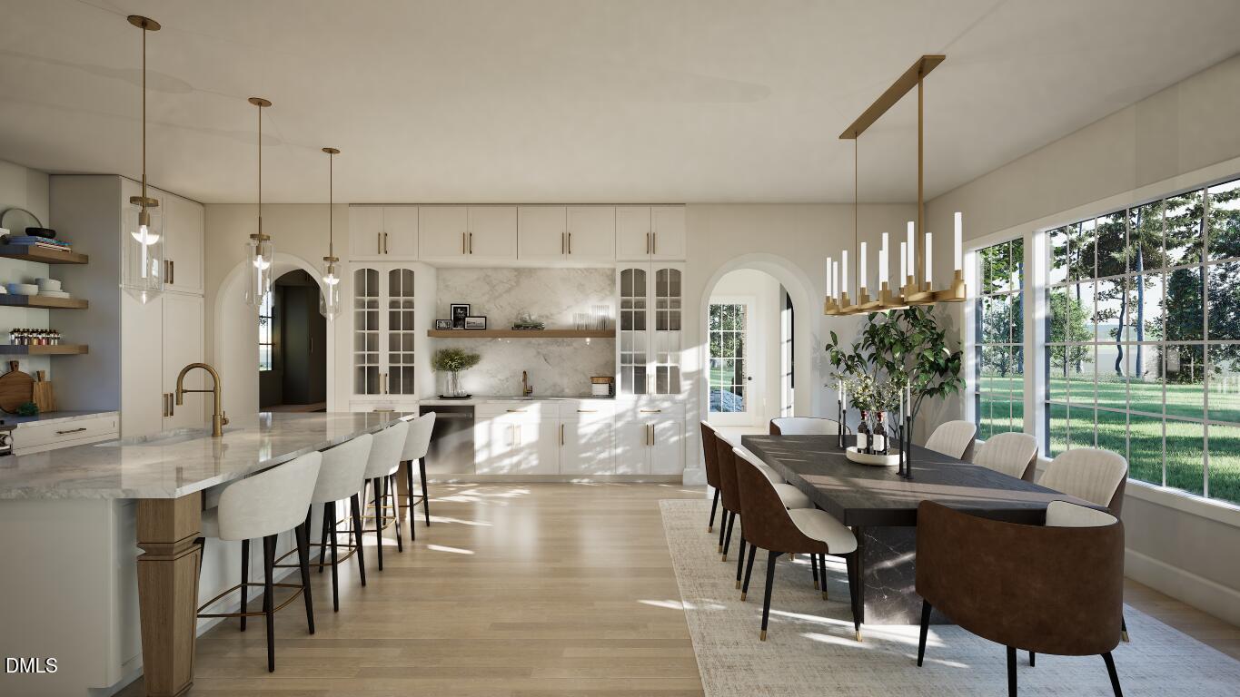3032 Lewis Farm Road Raleigh, NC 27607 - Photo 6 of 34 a view of a dining room and livingroom with furniture wooden floor a chandelier