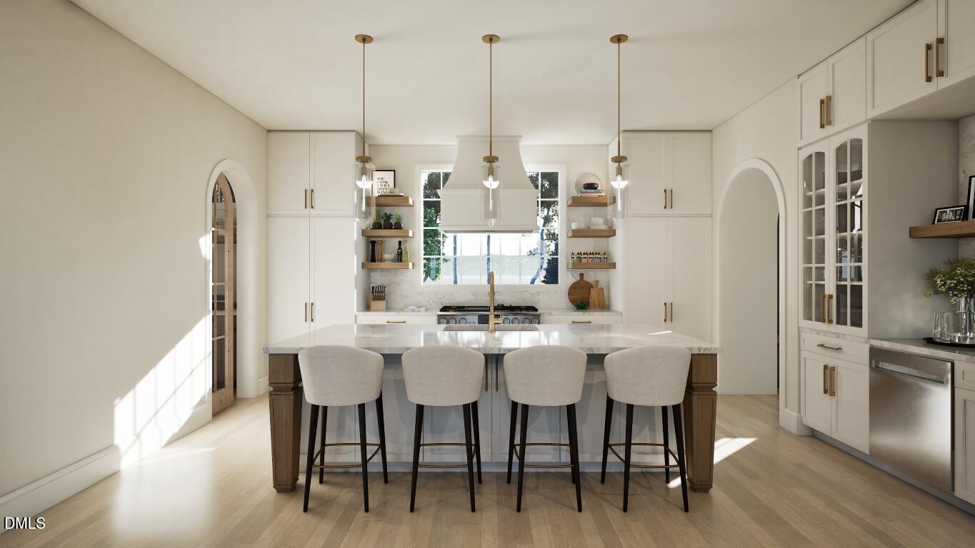 3032 Lewis Farm Road Raleigh, NC 27607 - Photo 7 of 34 a view of a dining room with furniture