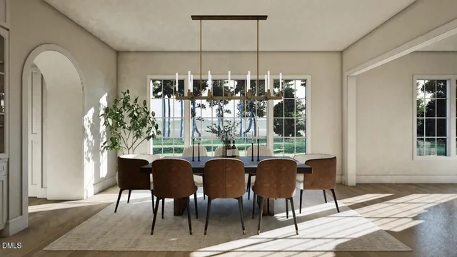a view of a dining room with furniture and chandelier