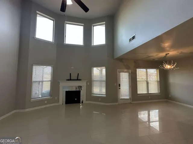wooden floor in a hall with a bathroom