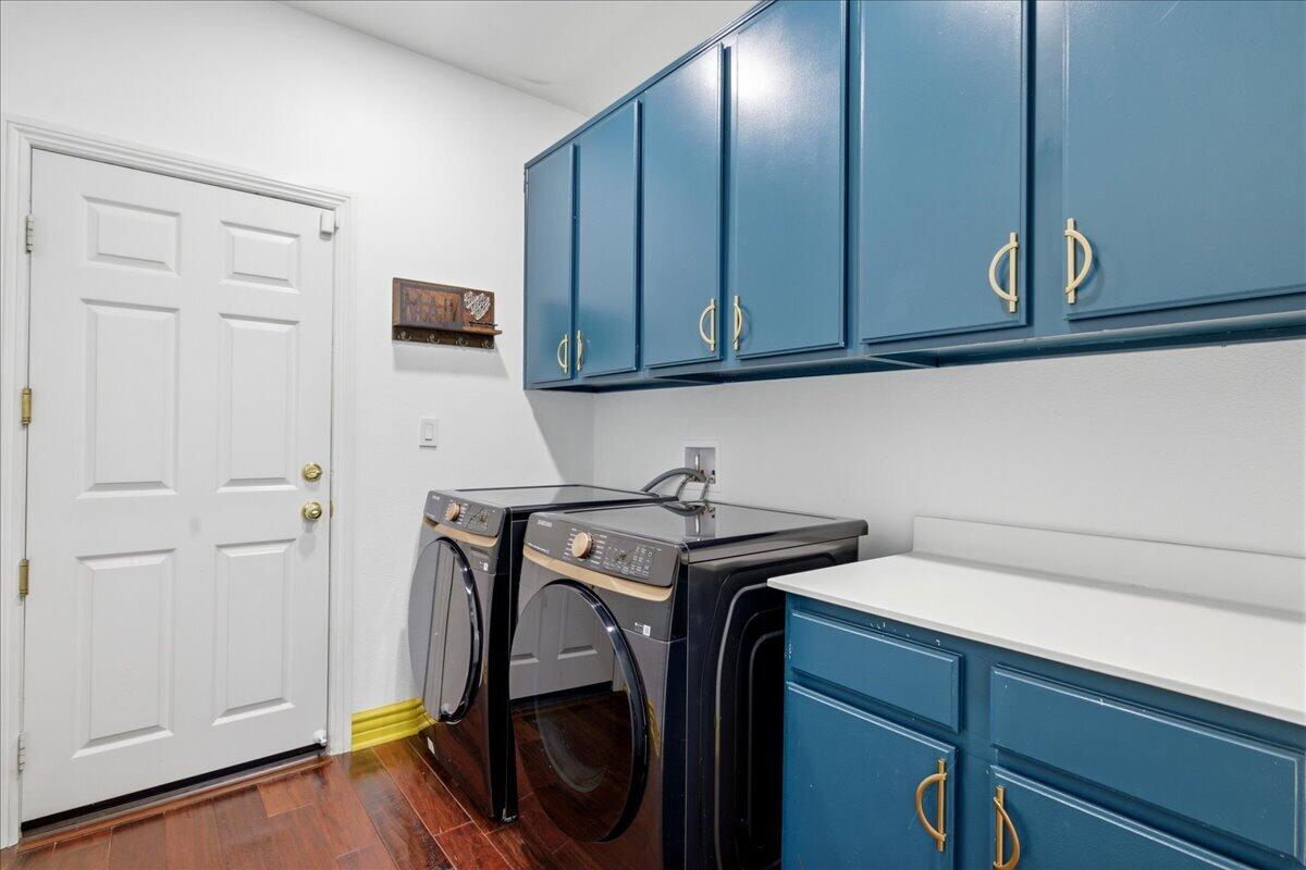 23732 Bella Vista Road Corona, CA 92883 - Photo 31 of 49 a utility room with dryer and washer