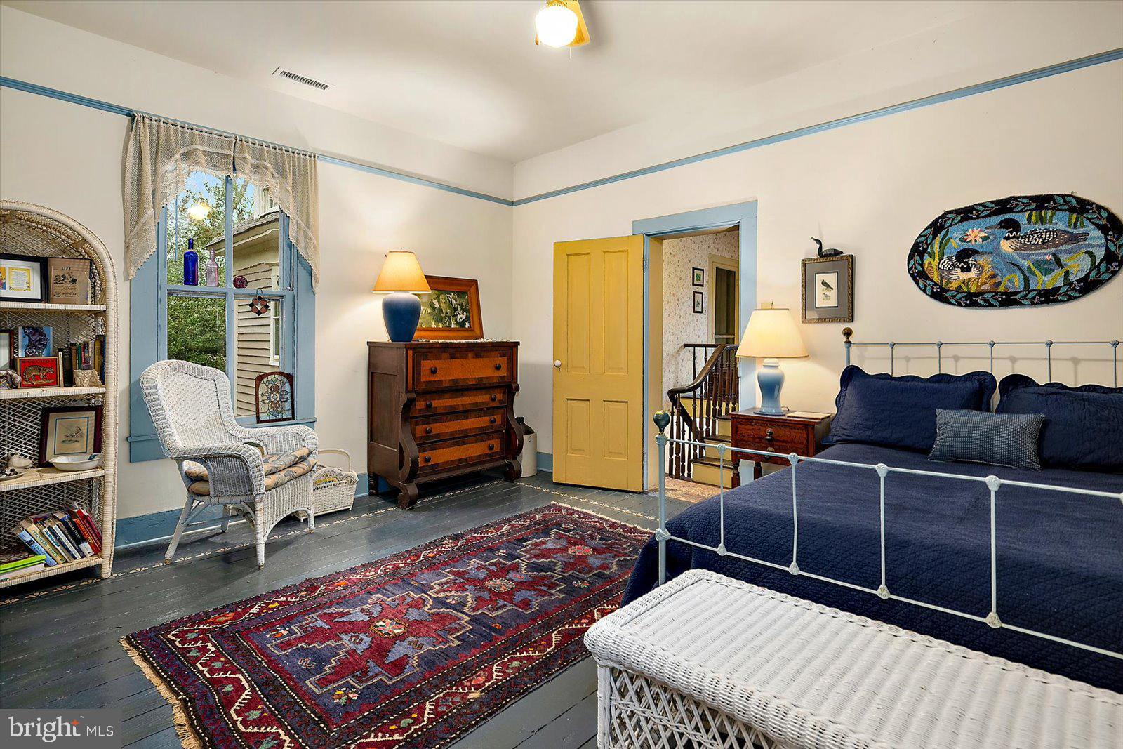 27947 Fairmount Road Westover, MD 21871 - Photo 102 of 122 a living room with furniture a rug and a window