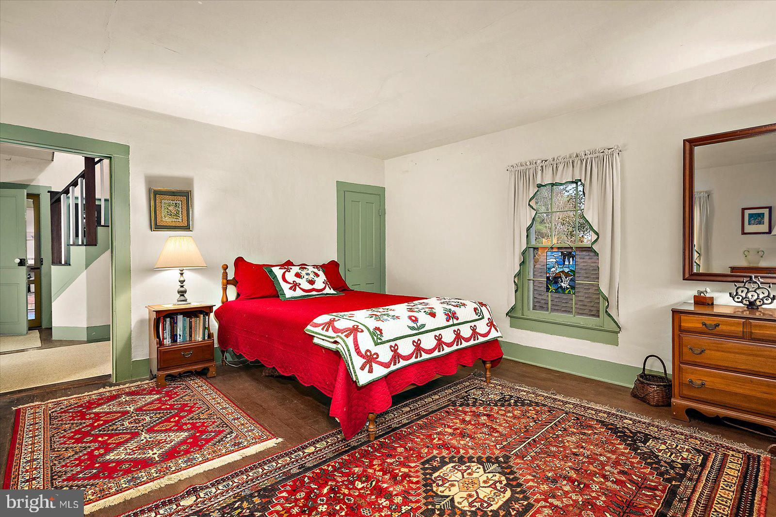 27947 Fairmount Road Westover, MD 21871 - Photo 115 of 122 a bedroom with two beds and painting on the wall