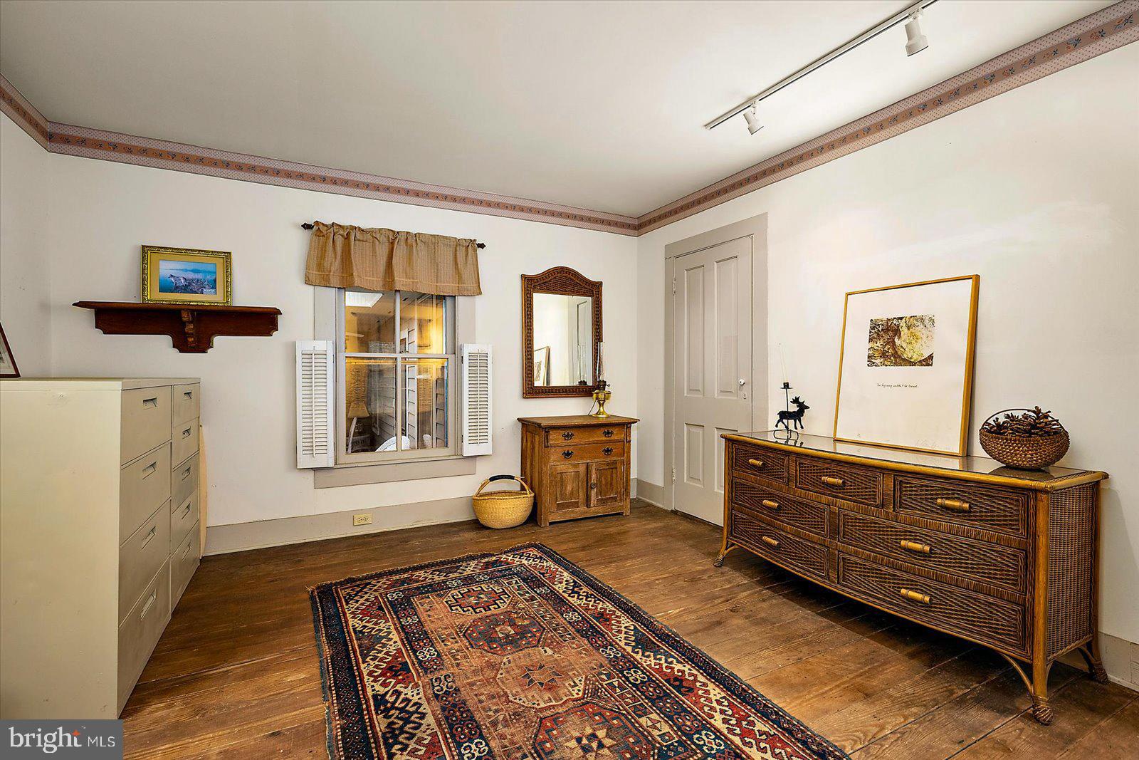 27947 Fairmount Road Westover, MD 21871 - Photo 121 of 122 a bedroom with a bed and a window