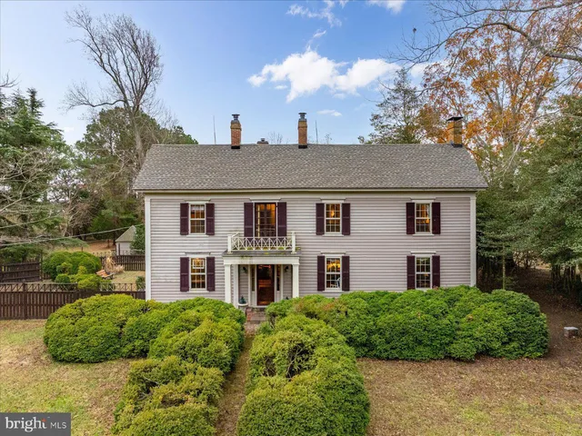 a view of a yard with trees