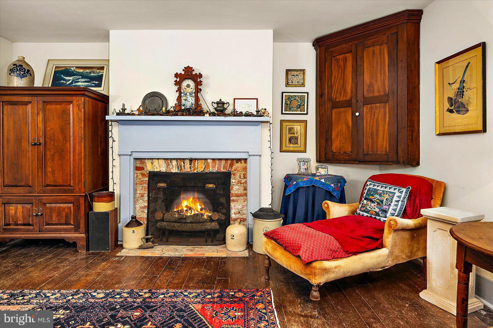 27947 Fairmount Road Westover, MD 21871 - Photo 58 of 122 a living room with furniture and a fireplace