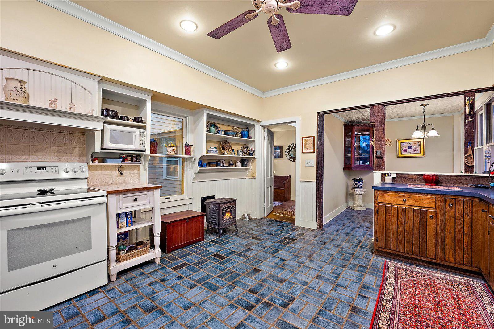 27947 Fairmount Road Westover, MD 21871 - Photo 70 of 122 a kitchen with stainless steel appliances granite countertop a stove and cabinets