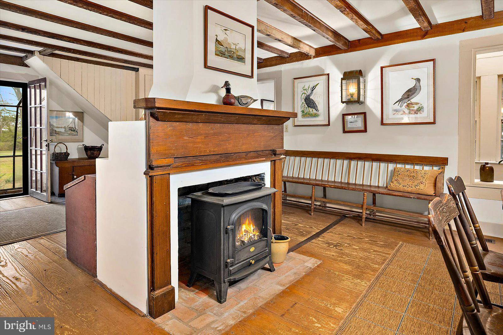 27947 Fairmount Road Westover, MD 21871 - Photo 75 of 122 a living room with furniture and a fireplace