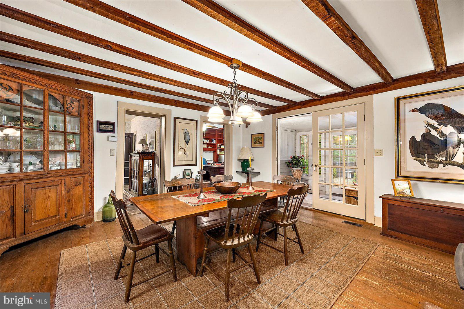 27947 Fairmount Road Westover, MD 21871 - Photo 80 of 122 a view of a dining room with furniture window and wooden floor