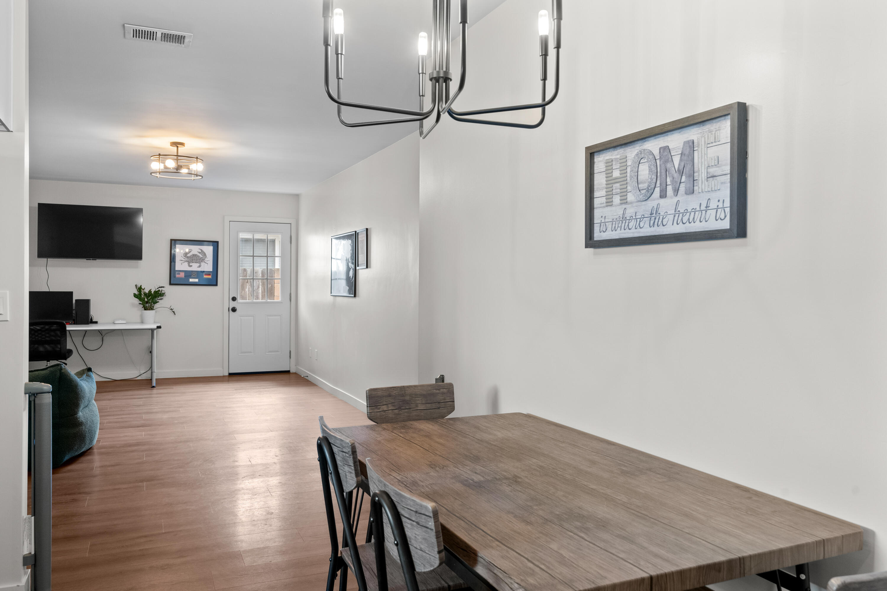 1220 West Lime Avenue Lompoc, CA 93436 - Photo 13 of 48 a view of a room with furniture and wooden floor