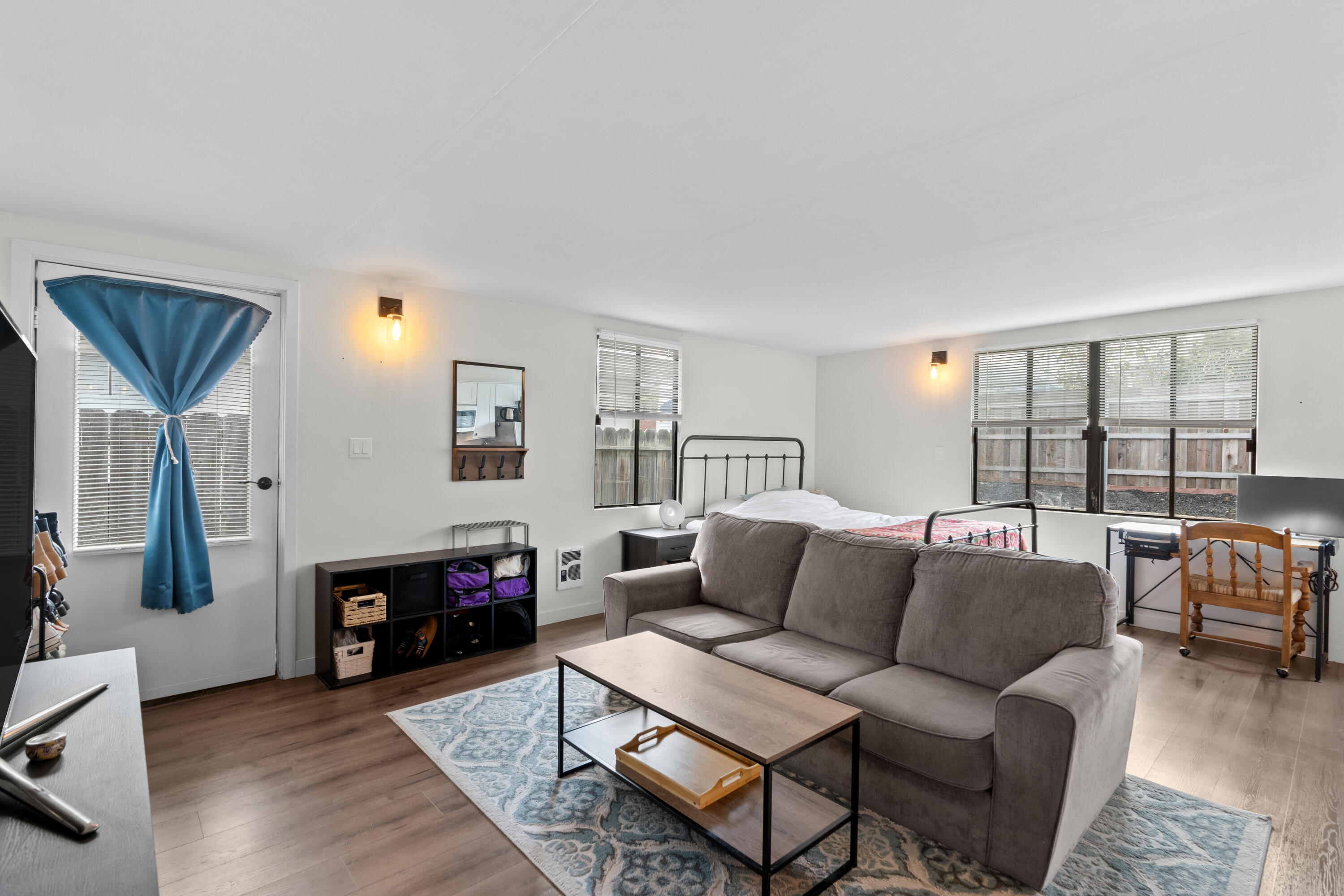 1220 West Lime Avenue Lompoc, CA 93436 - Photo 24 of 48 a living room with furniture and a fireplace