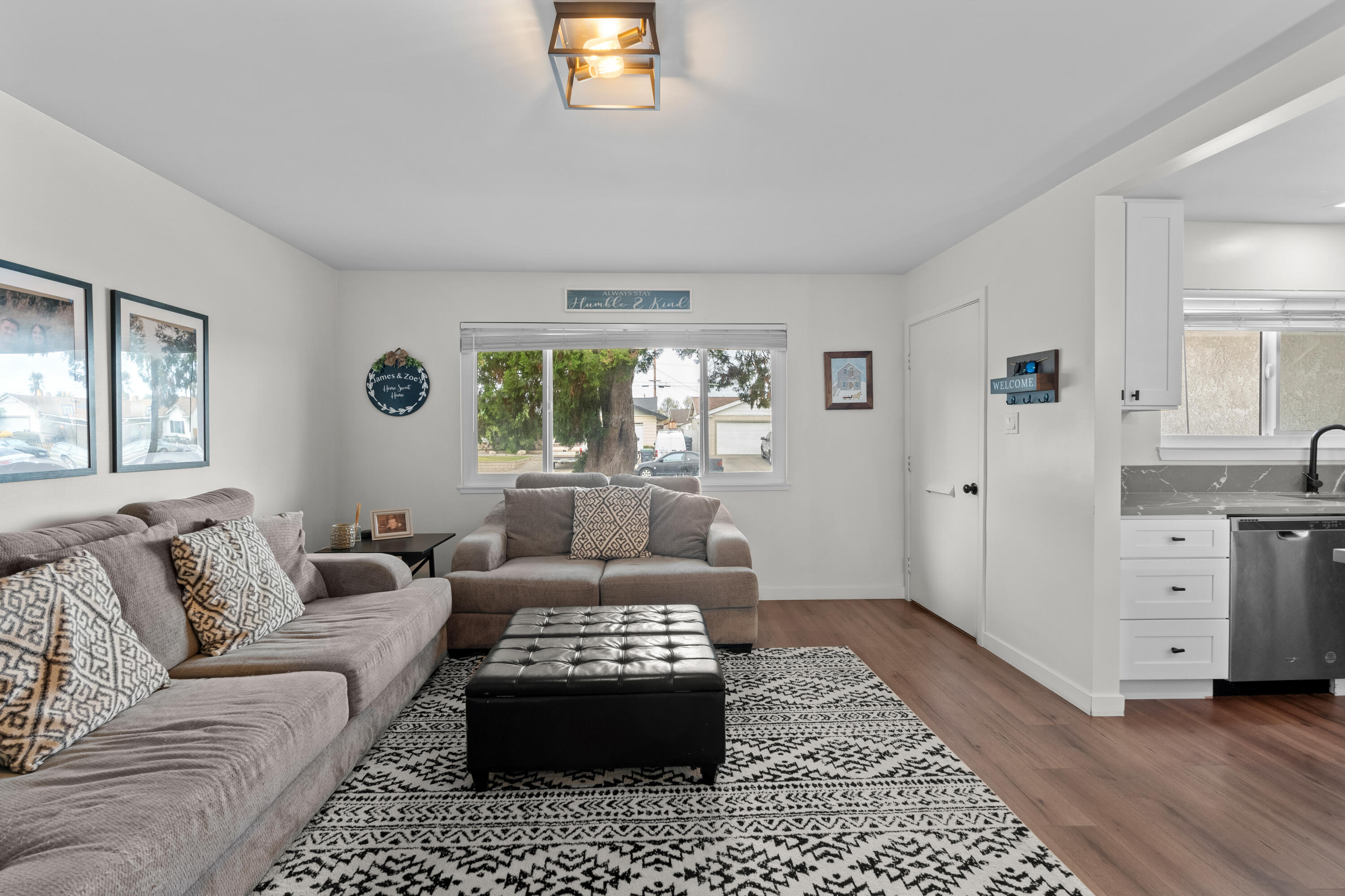 1220 West Lime Avenue Lompoc, CA 93436 - Photo 4 of 48 a living room with furniture and a rug
