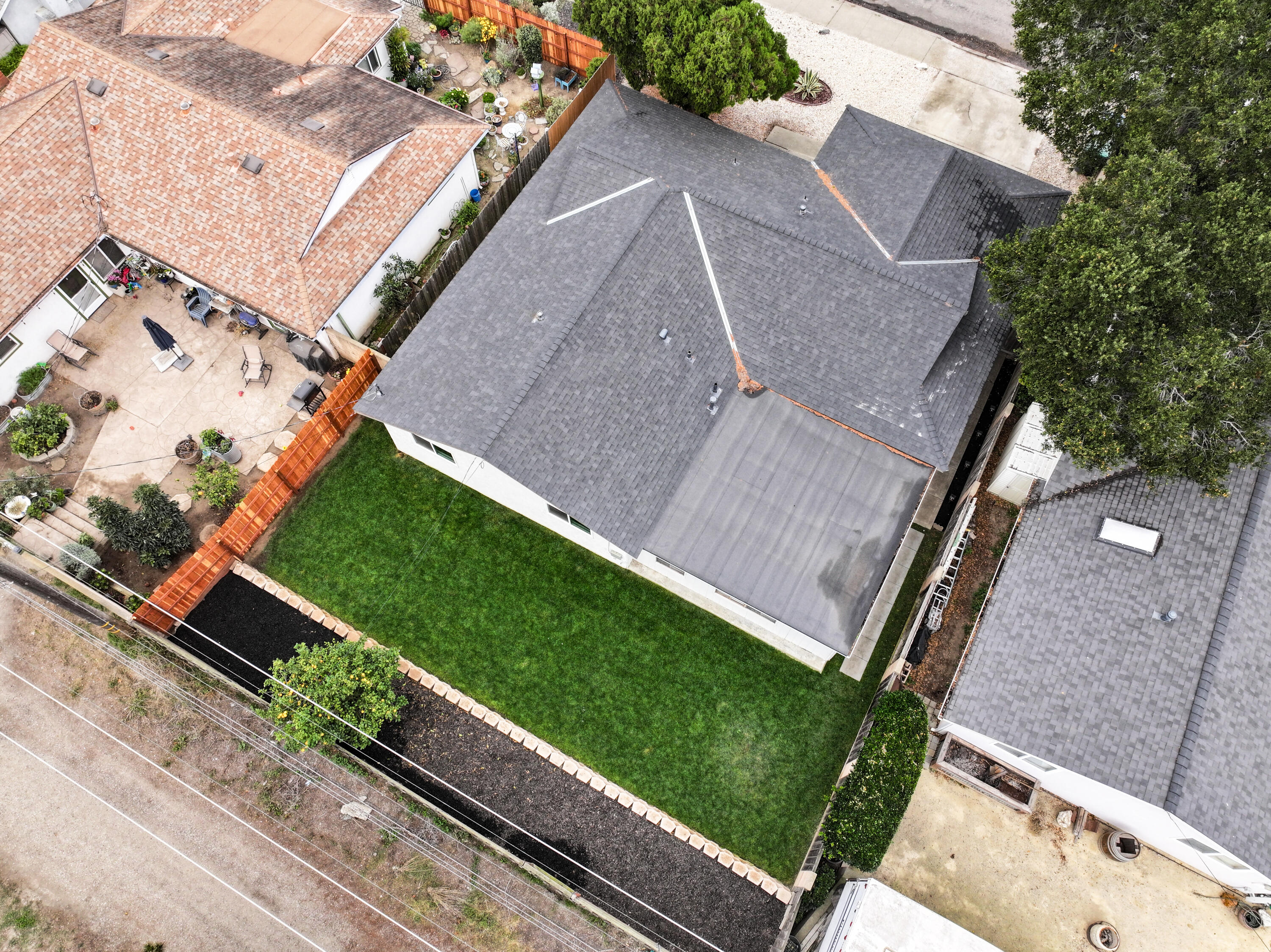 1220 West Lime Avenue Lompoc, CA 93436 - Photo 47 of 48 an aerial view of a house with a yard