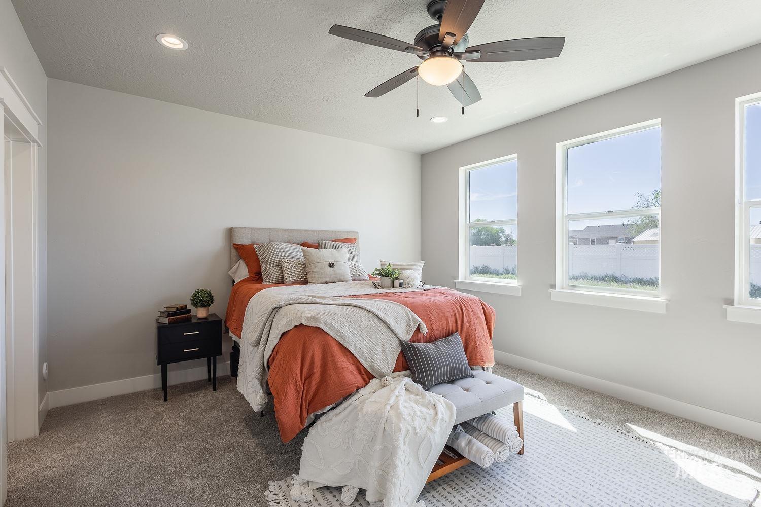 1171 West Recess Way Kuna, ID 83634 - Photo 11 of 28 Bright room featuring neutral wall tones