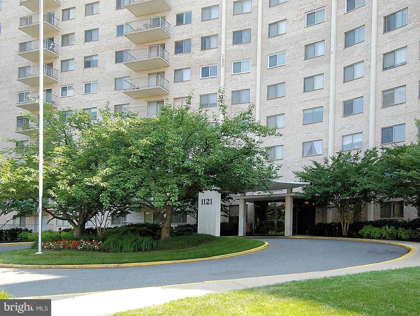 1111 University Boulevard West, Unit 907A Silver Spring, MD 20902 - Photo 3 of 15 a view of a building with garden