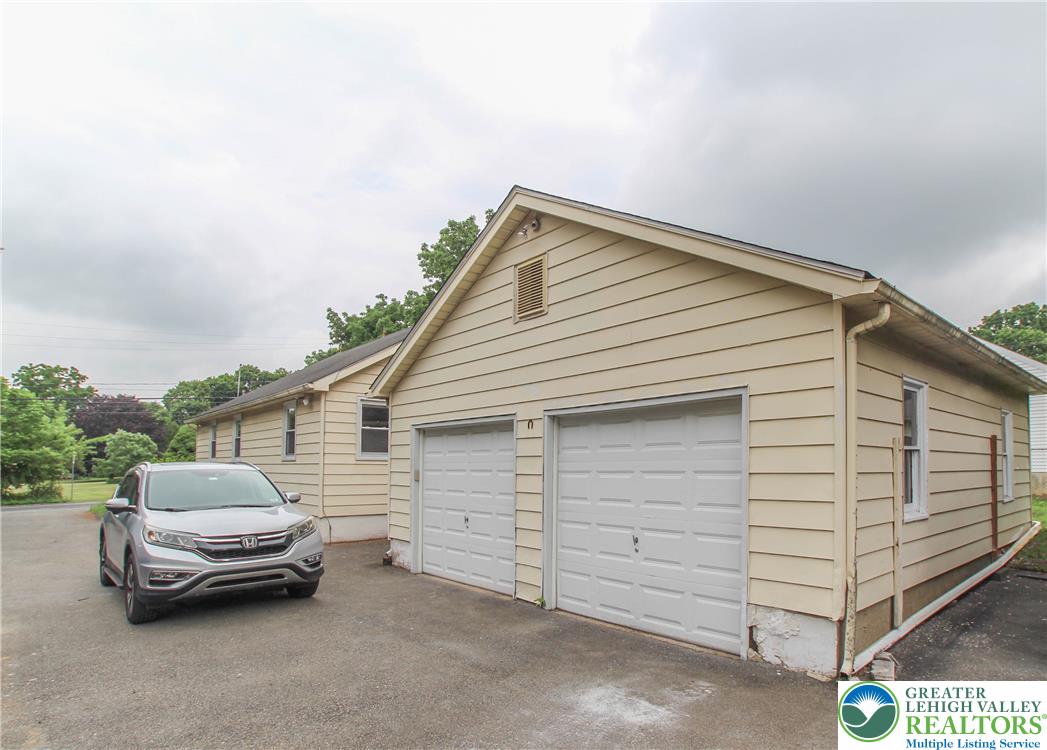 492 Filetown Road Nazareth, PA 18064 - Photo 8 of 30 A two-car garage with ample driveway space offers convenient parking.