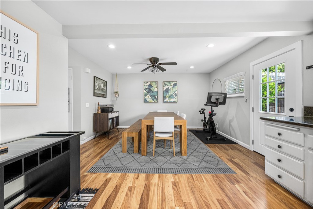 4237 Larwin Avenue Cypress, CA 90630 - Photo 17 of 48 a living room with furniture and a wooden floor