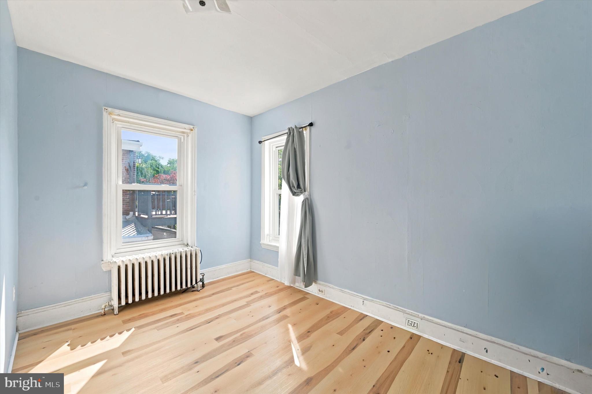 204 Ripka Street, Unit 2 Philadelphia, PA 19127 - Photo 17 of 22 a bedroom with a window